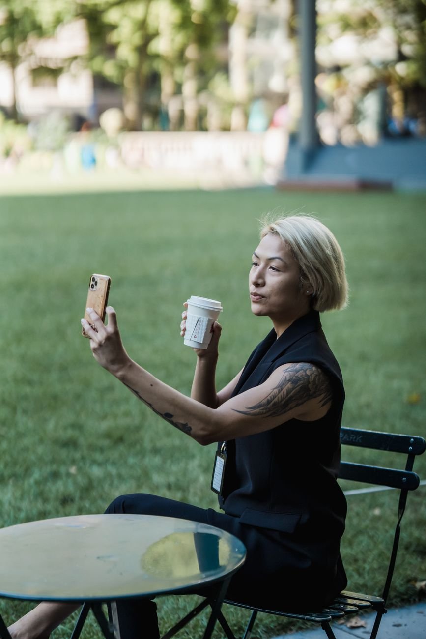 Woman asking her date a calm question about his outdated dating app photos