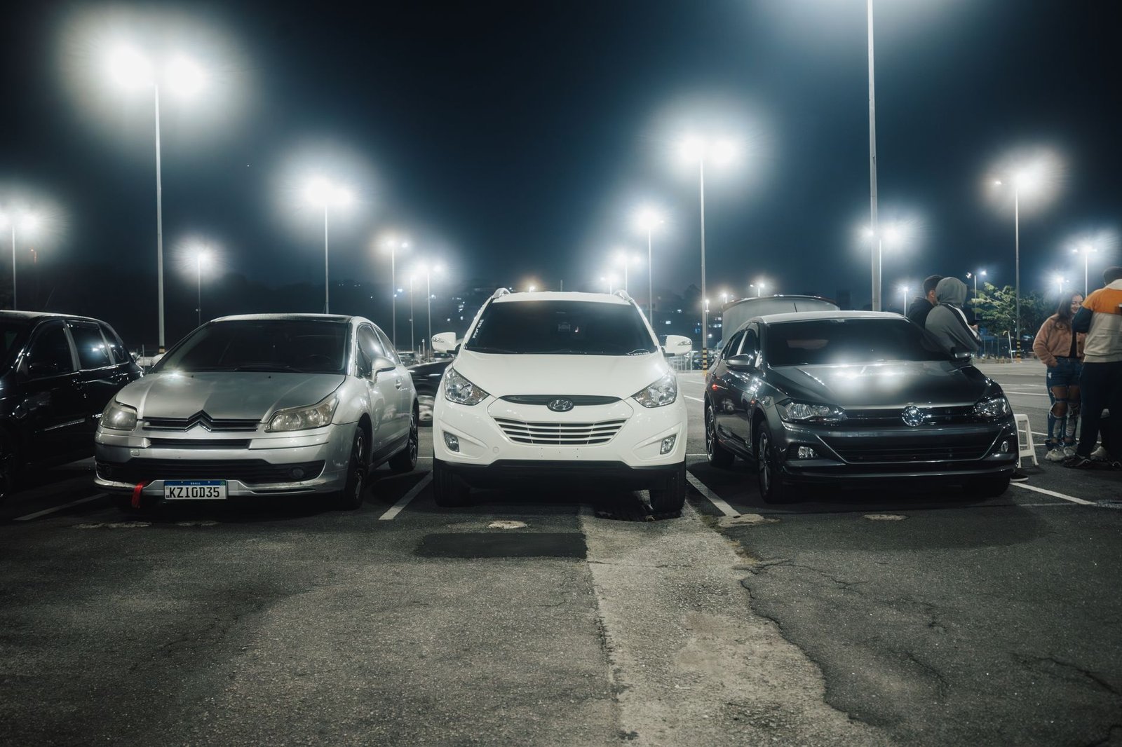 Parked car at night where an introvert takes a twenty minute break