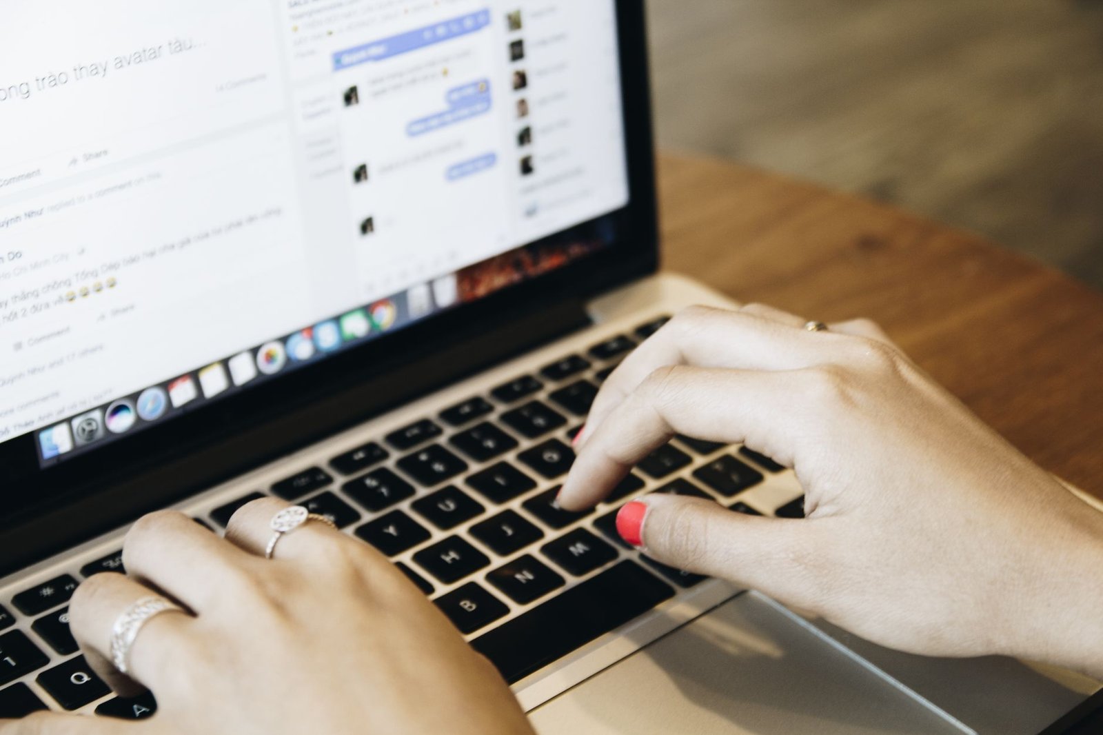 Woman typing a careful message to clear up a long distance miscommunication
