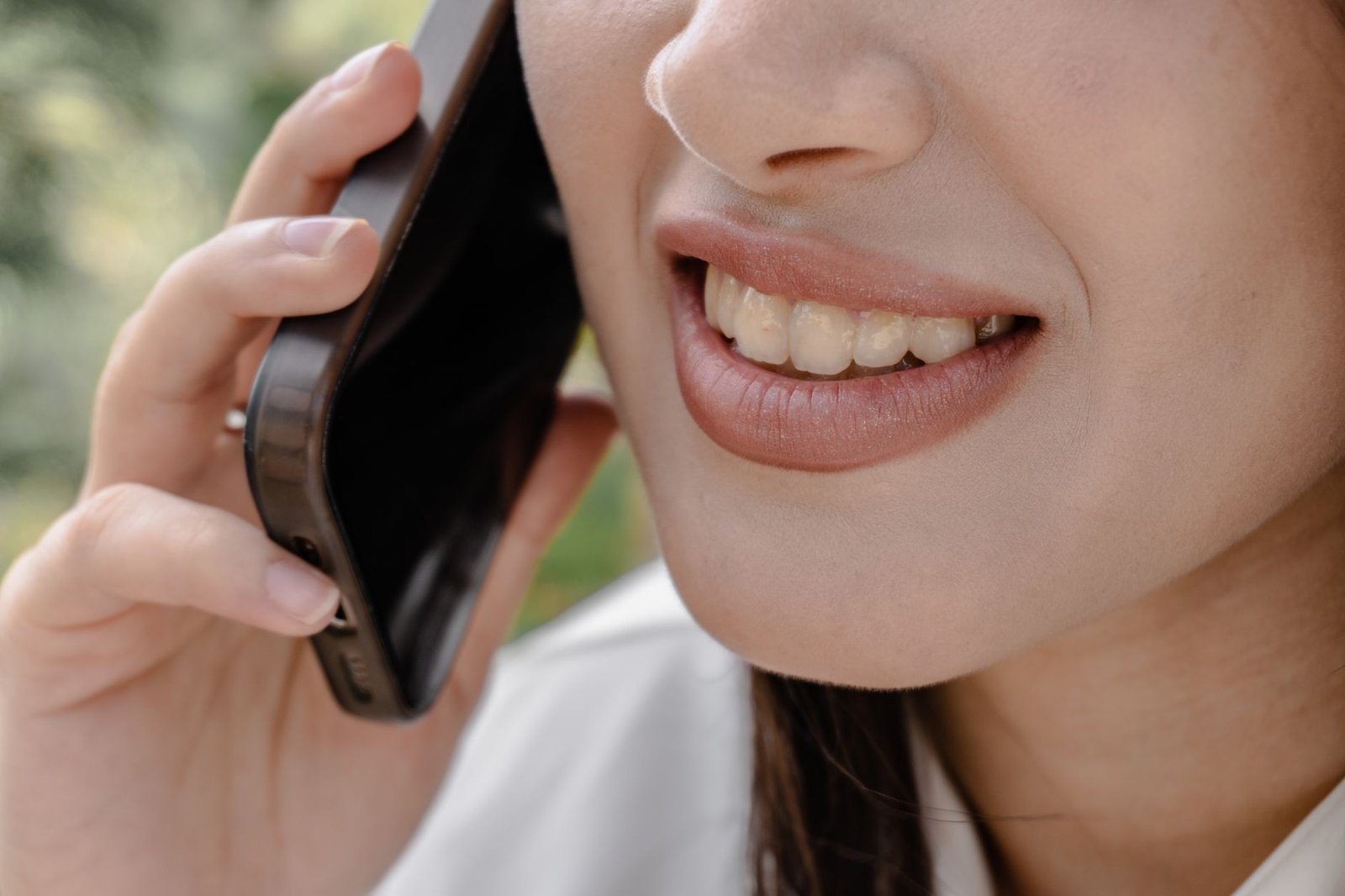 Woman about to delete a contact on her phone