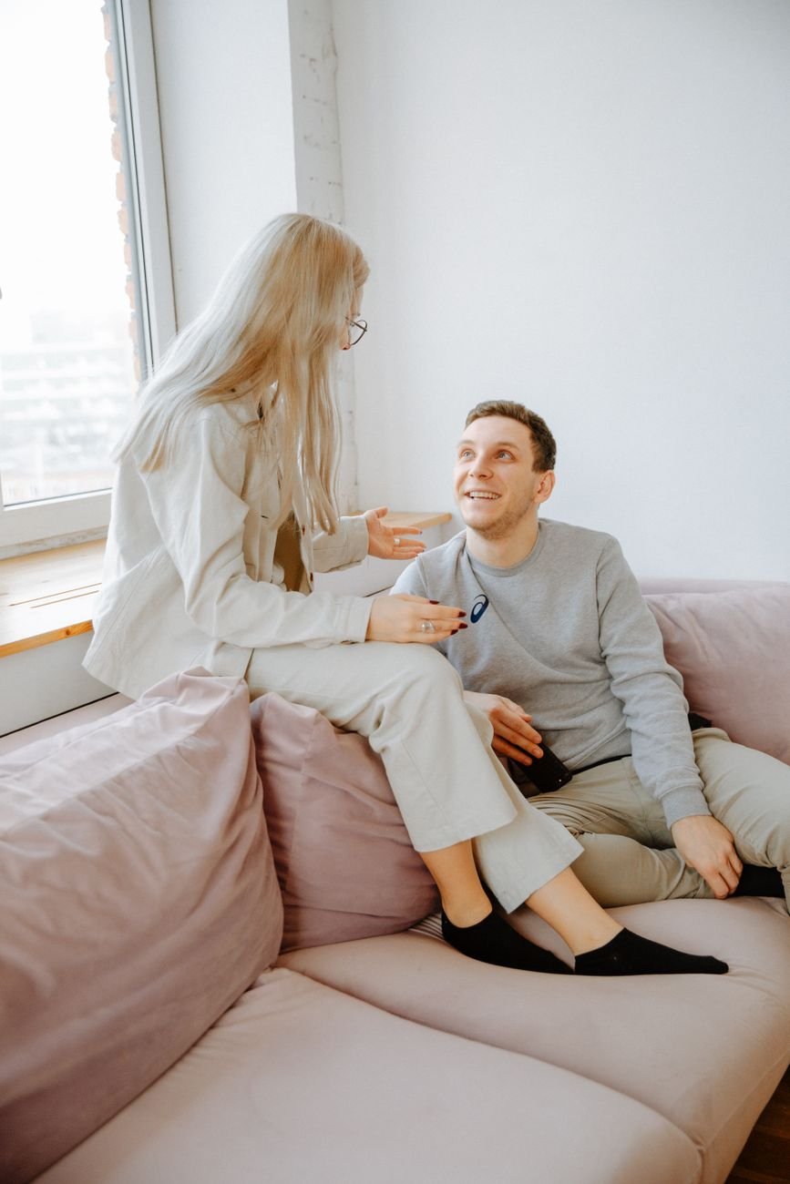 Woman asking her partner one small question over morning coffee