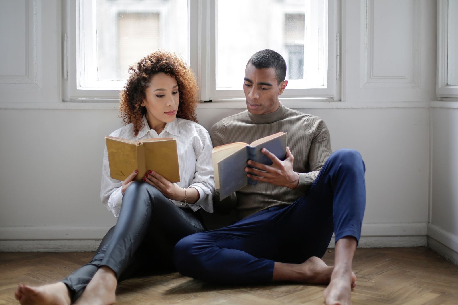 Couple reading together, sharing a book to feel connected long distance