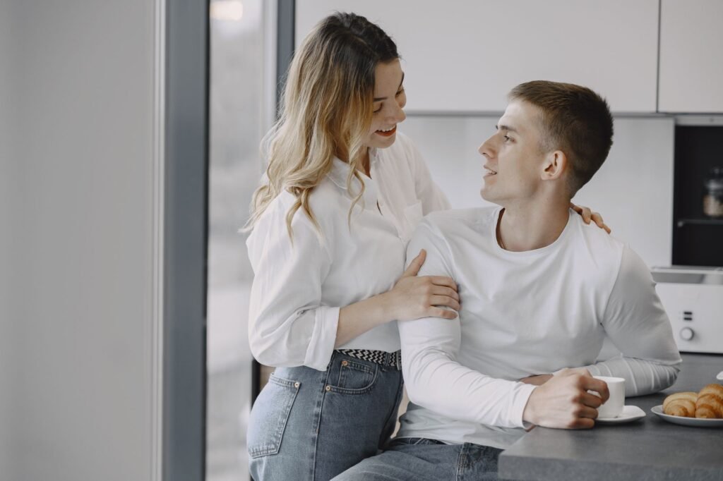 Couple having a heartfelt conversation in the kitchen