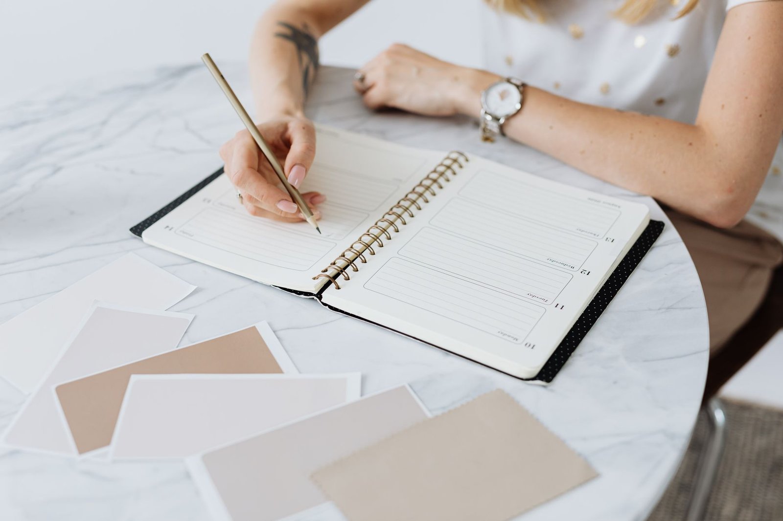 Woman writing notes at her desk to share later with her long distance partner