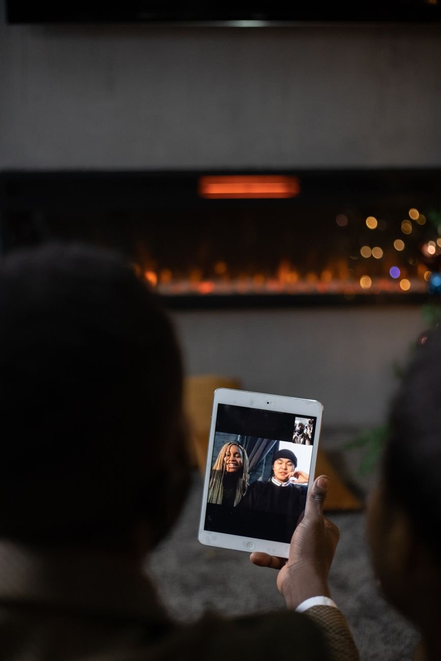 Couple sharing a cozy video call together to feel close despite the distance