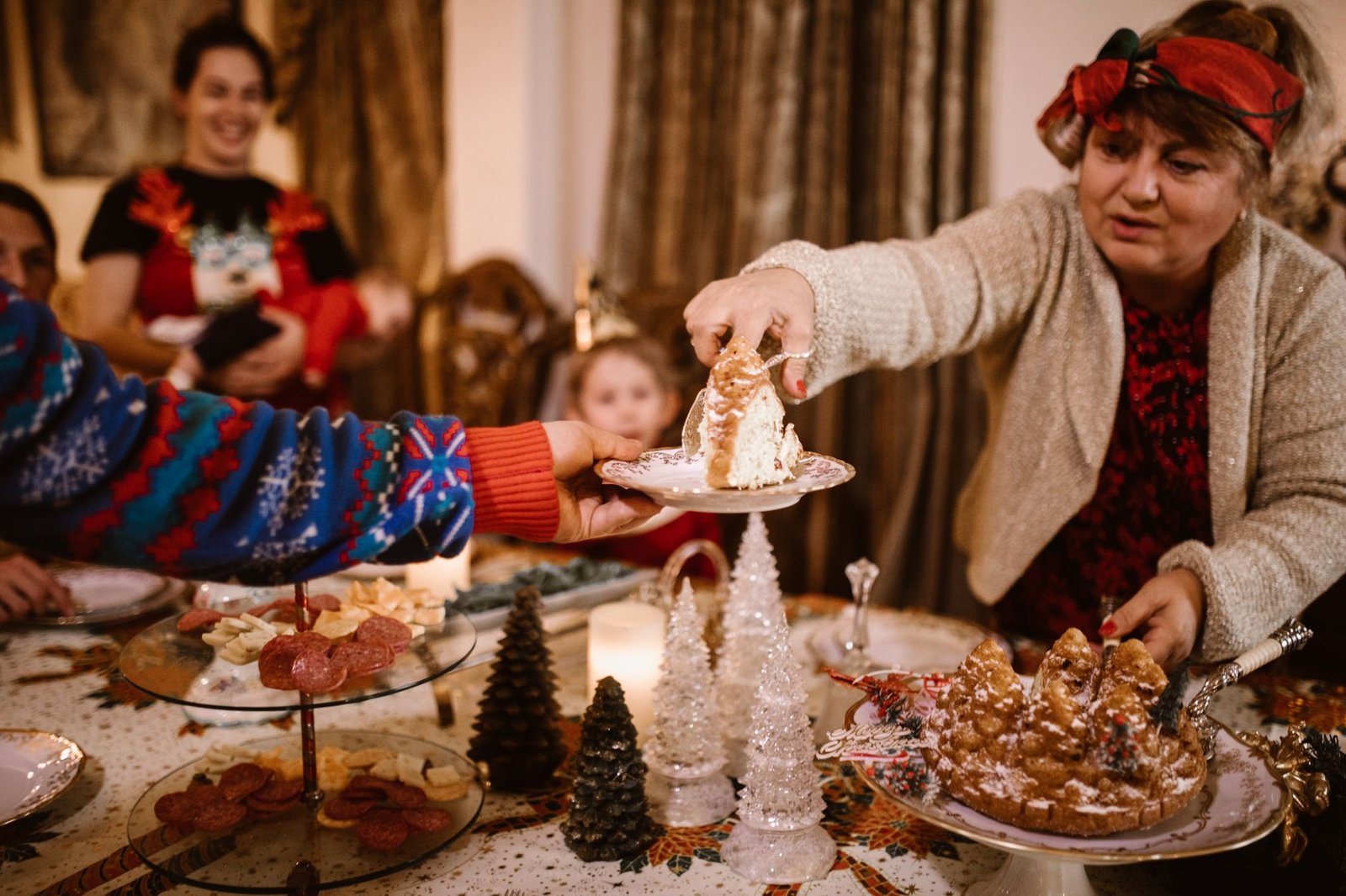 Family gathered at a holiday table the day his side learned the engagement news first