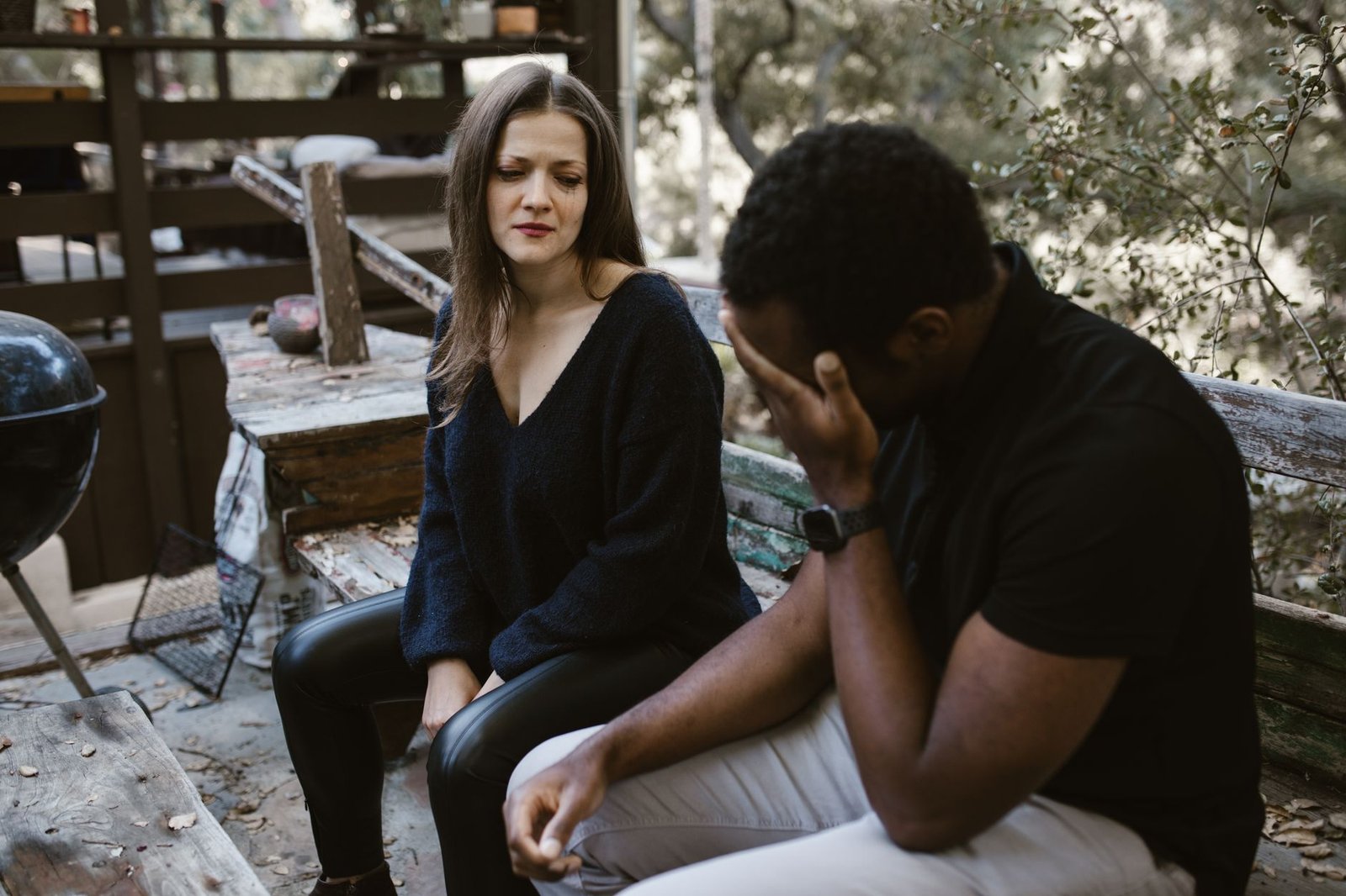 Couple sitting down to talk through a misunderstanding