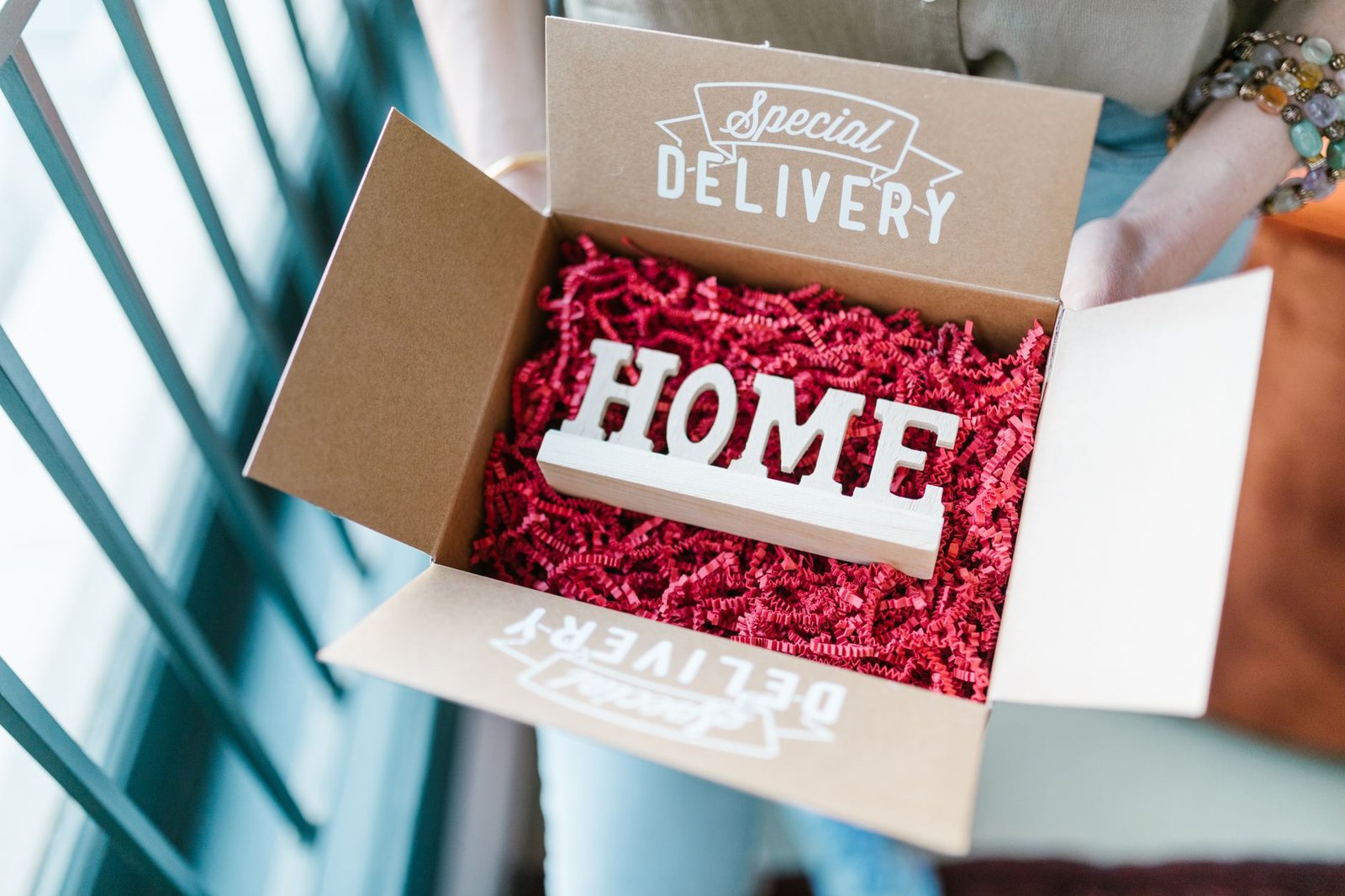 Care package box opened with a special delivery for a long distance partner