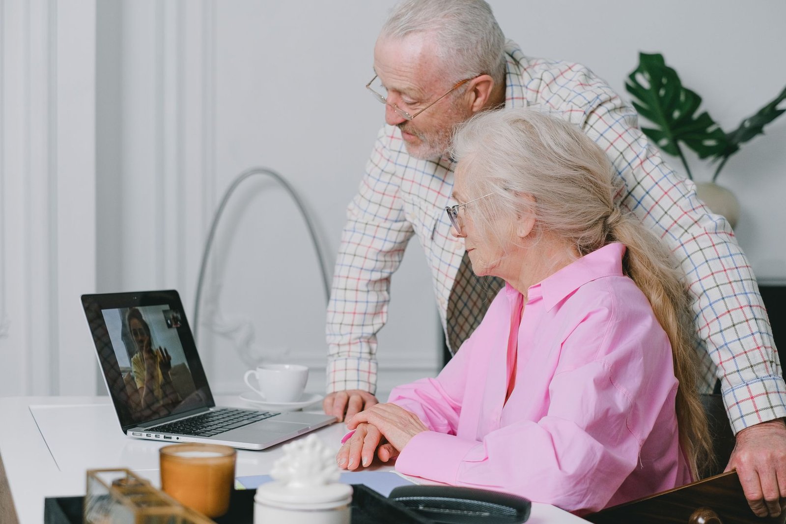 Couple on a video call using a laptop