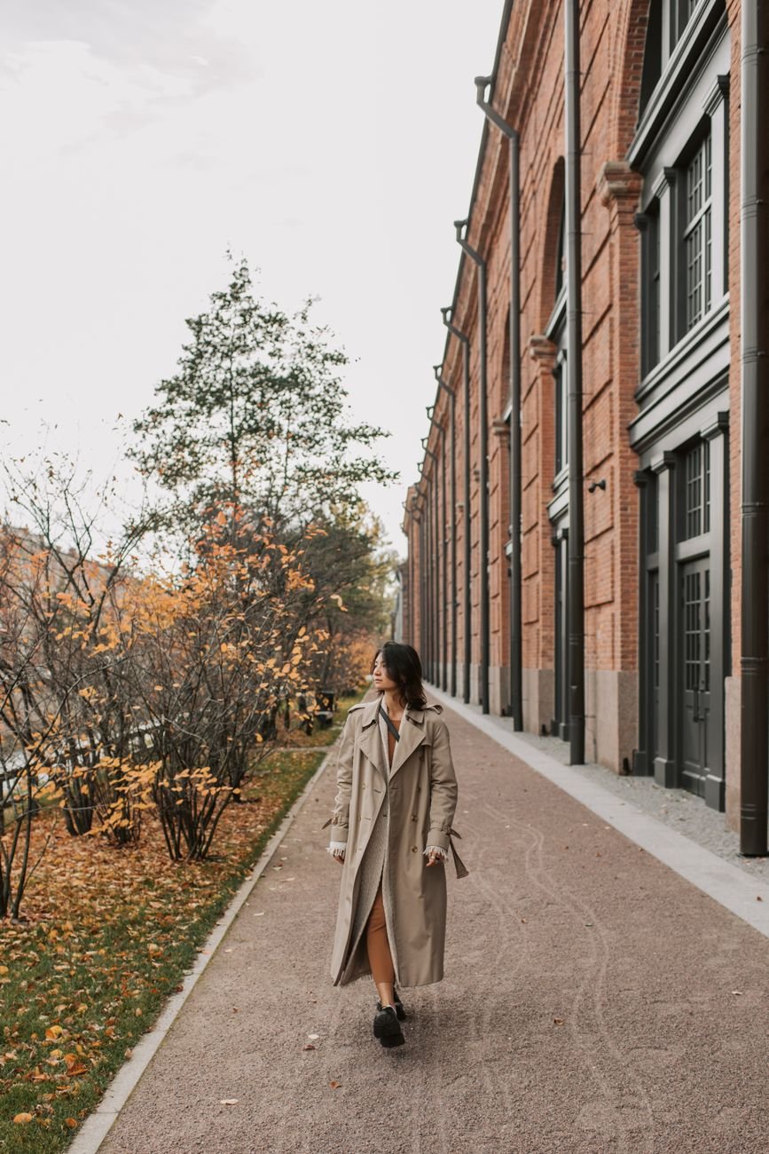 Woman walking outside in fall clothes clearing her head after being ghosted