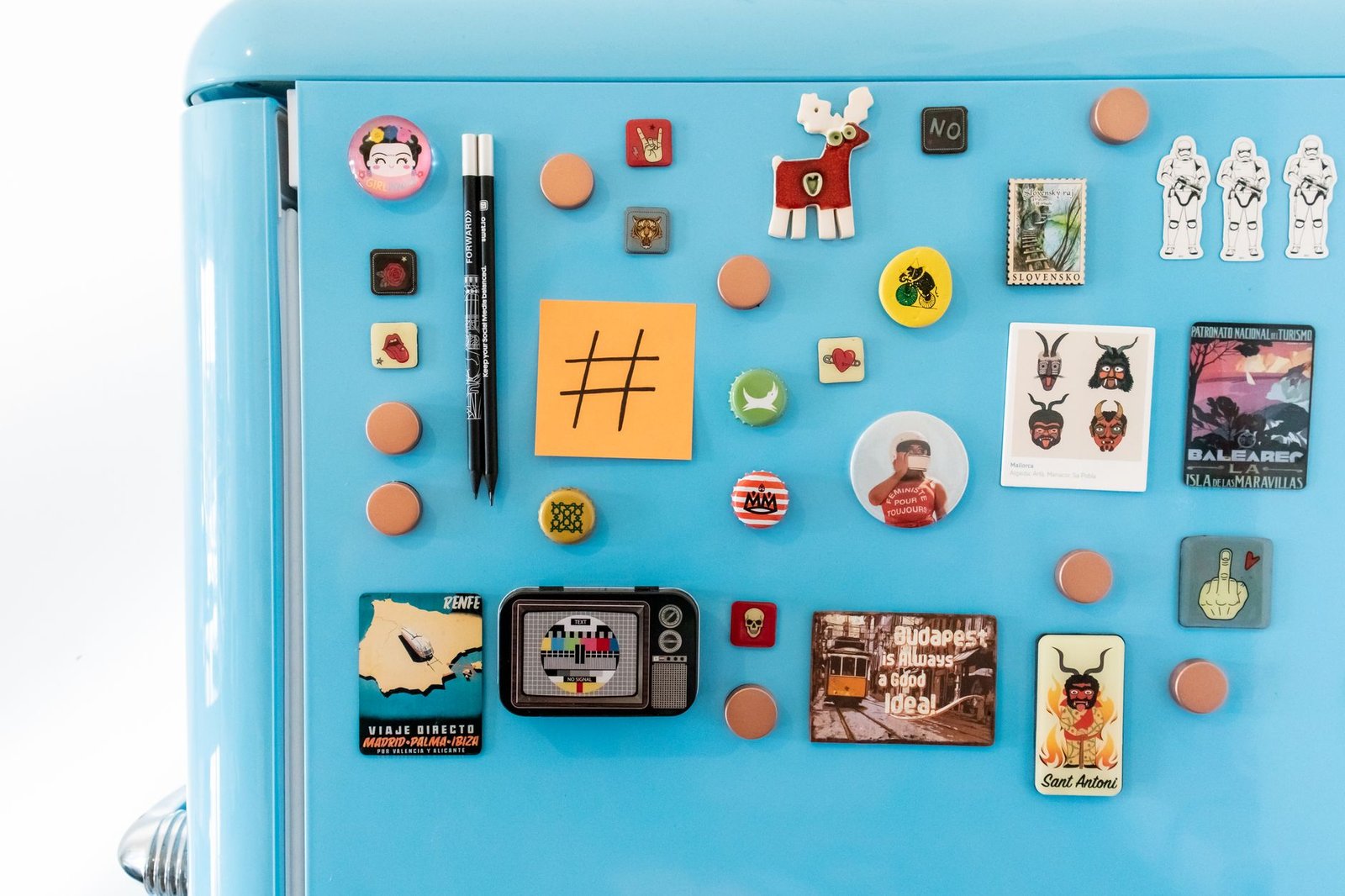 Sticky note on a fridge with a reminder for a couple