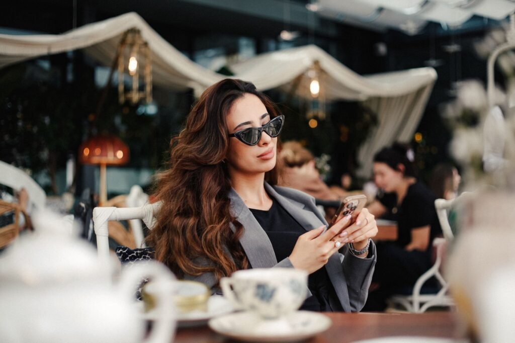 Woman sitting alone with her coffee processing a hard photo