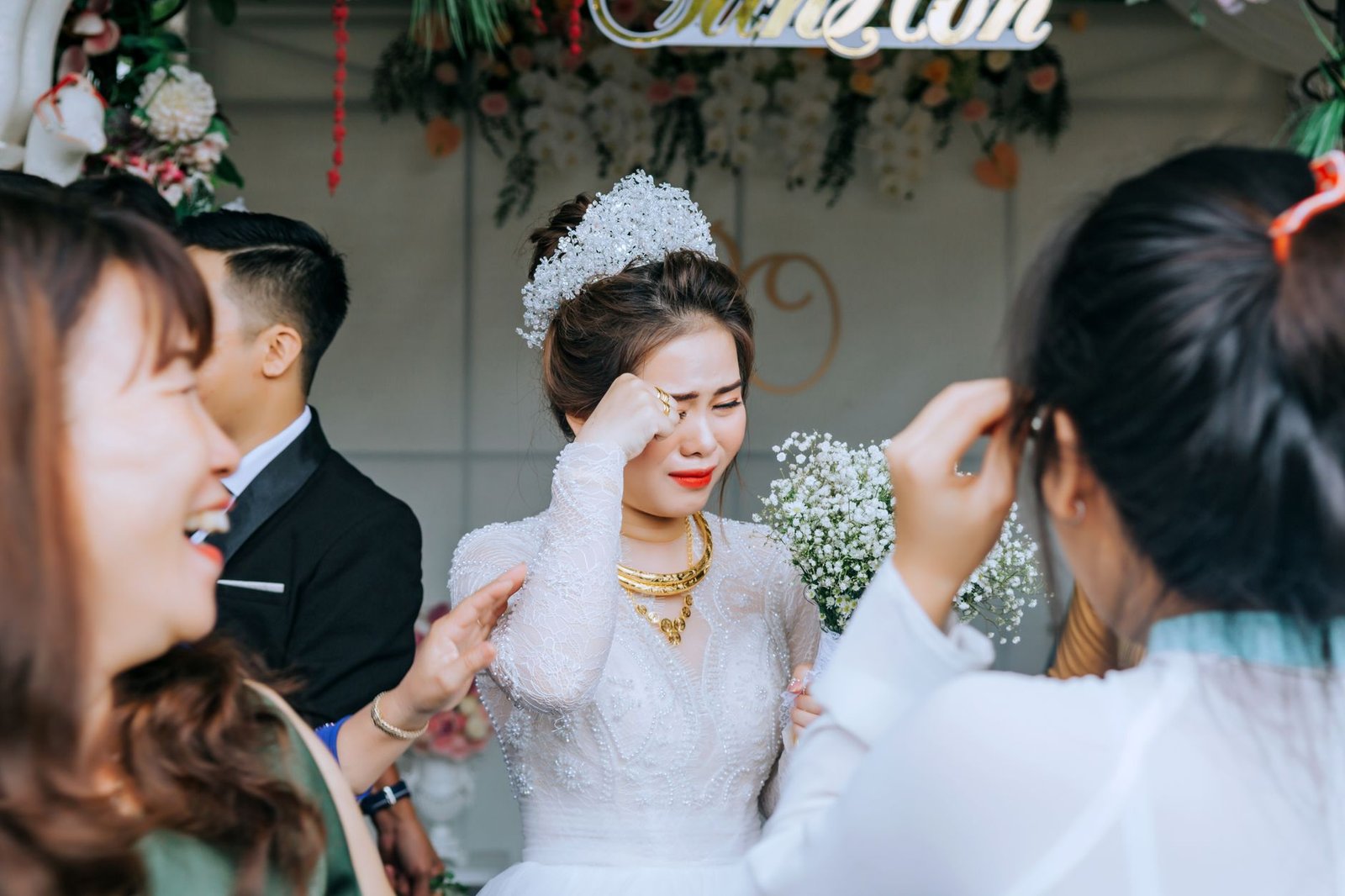 Woman crying happy tears during an emotional family celebration