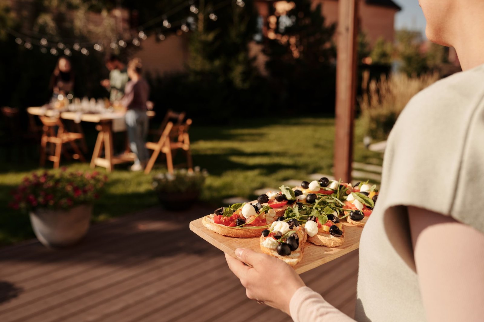Family and friends gathered for a summer backyard party celebration