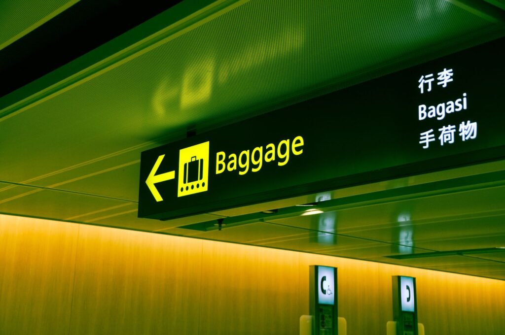 Woman apologizing to her boyfriend at the airport over a delay
