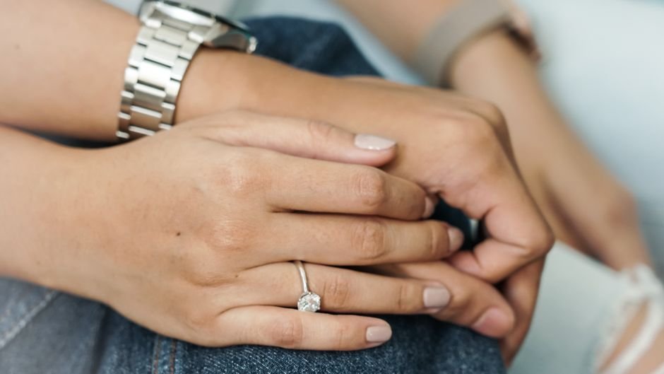Jeweler resizing an engagement ring at the counter